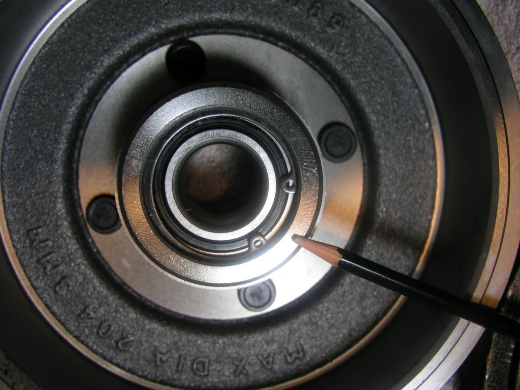 Rear wheel bearing failure? + Brake stuck ON + brake pads stuck onto